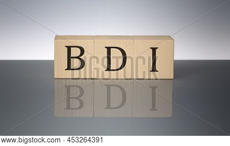 Bdi Concept, Wooden Word Block On Grey Background