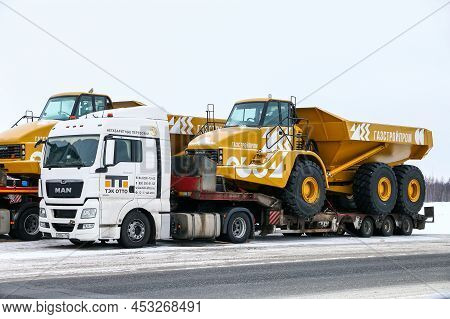 Novyy Urengoy, Russia - March 19, 2022: Semitrailer Truck Man Tgx 18.480 Carrying The Caterpillar Ar