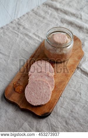 Homemade Jagdwurst On A Rustic Wooden Board, Side View.
