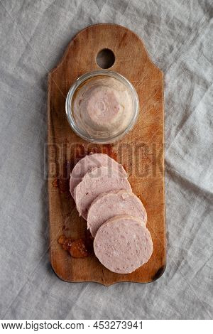Homemade Jagdwurst On A Rustic Wooden Board, Top View. Flat Lay, Overhead, From Above.