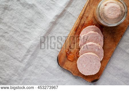 Homemade Jagdwurst On A Rustic Wooden Board, Top View. Flat Lay, Overhead, From Above. Space For Tex