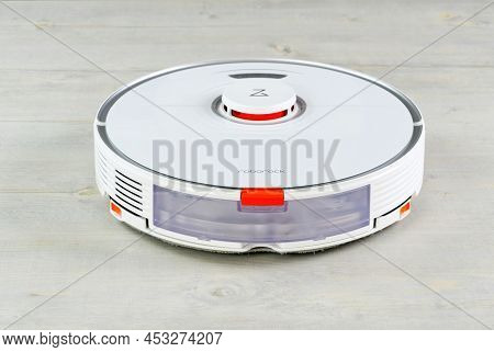 Tallinn, Estonia - March 03, 2022: Xiomi S7 Roborock Vacuum Cleaner Performs Automatic Cleaning On W