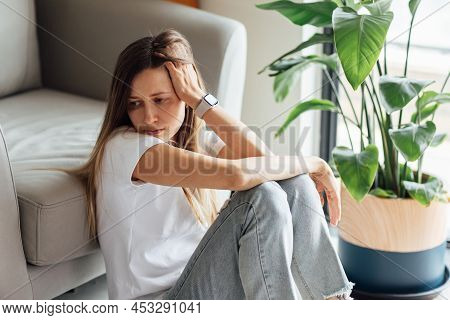 Unhappy Young Caucasian Woman With Blonde Hair Thinking About Bad Relationships Problems, Break Up W