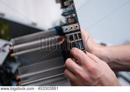 Repair Assembly Of Microcomputers And Motherboard. Computer Maintenance Concept