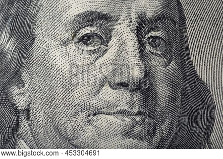 Portrait Of Ben Franklin On The Us 100 Dollar Bill In Macro. Benjamin Franklin On Hundred Dollar Ame