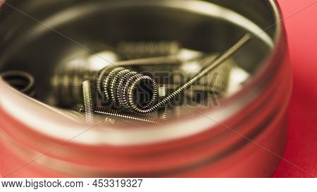 Pre-built Coils For Vape In Box. Iron Winding For Maintenance Of Electronic Systems. Concept Of Vapi
