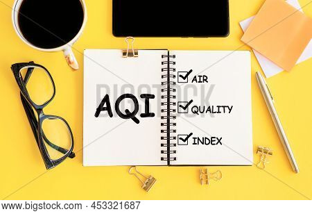Alphabet Letter In Word Aqi Abbreviation Of Air Quality Index On Yellow Office Background