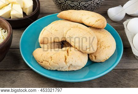 Chipas, Typical South American Cheese Bun Over Wooden Table With Ingredients.