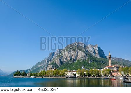 Lecco, Italy - April 15, 2022: Como Lake And Town Of Lecco Waterfront, Lombardy Region Of Italy