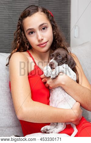 Beautiful Young Girl With Her Small French Braque Puppy