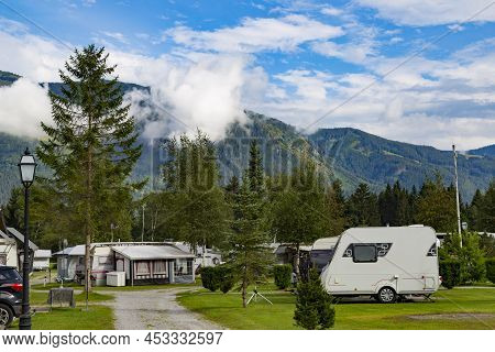 Camp. Autocamping In The Mountains. Summer  Holiday In The Mountains. Camping On The Background Of M