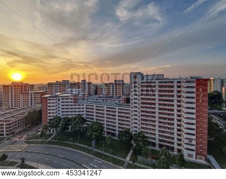Singapore- Apr 12, 2022: Residential Apartment And Housing Blocks (hdb) Estate During Sunset In Sing