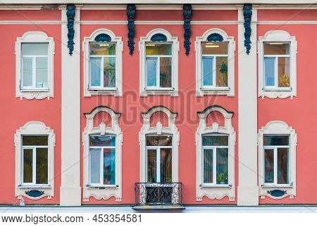 Many Windows In A Row On The Facade Of The Urban Historic Apartment Building Front View, Saint Peter