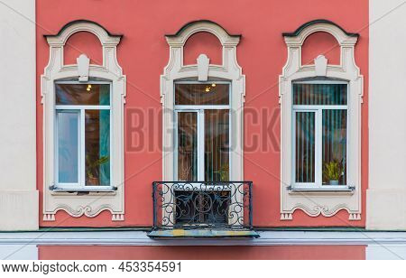 Three Windows In A Row On The Facade Of The Urban Historic Apartment Building Front View, Saint Pete