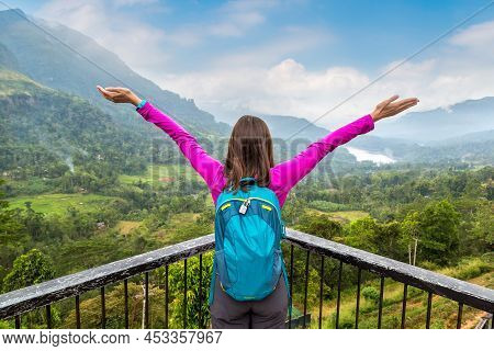 Woman Rissing Hands  At The Nature Landscape Of Ella In A Summer Day In Sri Lanka