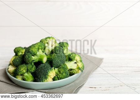 Broccoli Of Fresh Green Broccoli In Bowl Over Coloredbackground. , Close Up. Fresh Vegetable.