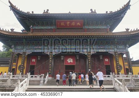 Zhenjiang, China. August 12, 2017. Chinese Tourists Visiting The Great Buddha Hall Within The Jinsha
