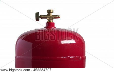 Red Metal Gas Cylinder For Lpg With A Valve Isolated On White Background. Selective Focus.