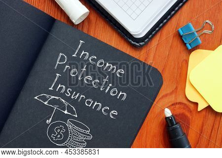 Income Protection Insurance Is Shown Using The Text And Picture Of The Umbrela