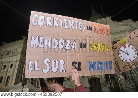 Buenos Aires, Argentina; April 22, 2022: Earth Day; Posters In Front Of The Congress: A Clock With N
