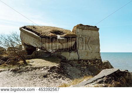 Ruins Of Bunkers On The Beach Of The Baltic Sea, Part Of An Old Fort In The Former Soviet Base Karos