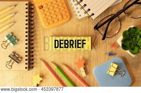 Debrief Word In A Dictionary. Debrief Concept.