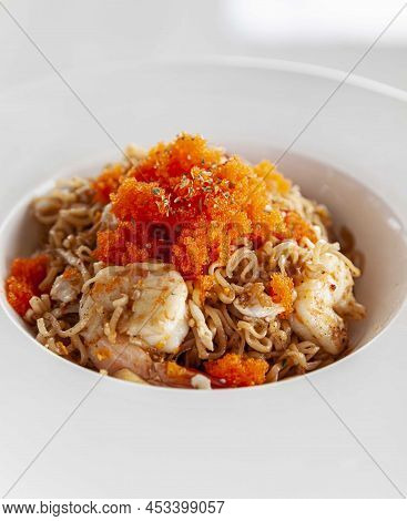 A Plate Of Instant Noodles Stir-fried With Fresh Shrimp And Ebiko
