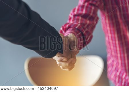 Team Business Partners Shaking Hands Together To Greeting Start Up Small Business In Meeting Room. S