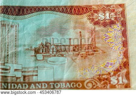 Detail Of A Used One Dollar Banknote From Trinidad And Tobago Showing The Anhydrous Ammonia Plant Of