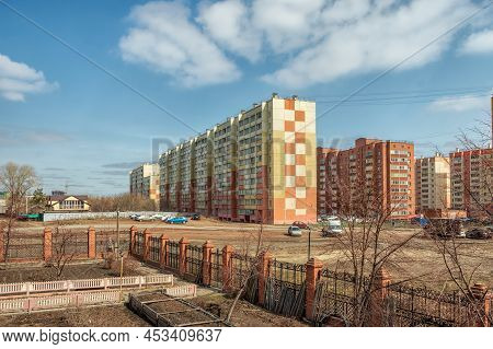 Urban Landscape, Multi-storey Residential Buildings Against The Background Of A Cloudy Sky. The Phot