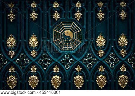 Ying And Yang Symbol Hang On The Gate Of A Taoist Temple In Chengdu, China