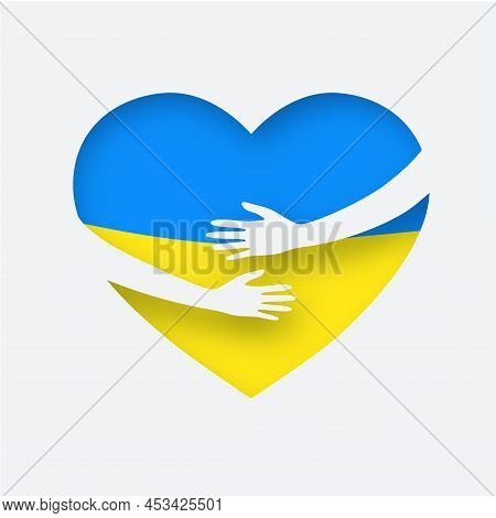 Support For Ukraine. Ukraine In The Heart Concept. Hands Hugs A Heart With The Colors Of The Ukraini