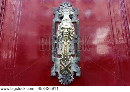 European Vintage Old Metal Wrought Iron Door Knocker. Design Detail. Paris.
