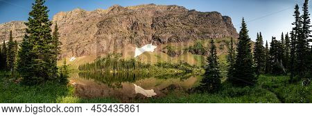 Panorama Of Morning Start Lake And Ridge Beyond In Glacier National Park