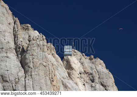 The View Of Punta Rocca 3309 M , With The Mountain Station For The Malga Ciapela Cable Car, Italian 