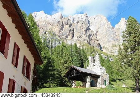 Italy, Contrin Valey - August 27 2016: The View Of Malga Contrin Alm And Mountain Massif On Backgrou
