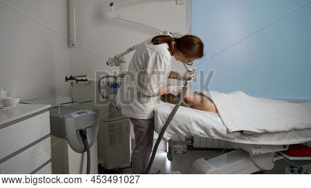 Lymphatic Drainage Massage Apparatus Massage Process. Therapist Cosmetologist Makes A Rejuvenating F