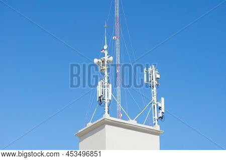 Repeater Tower 5g. Antennas Against The Blue Sky, Communication Tower.