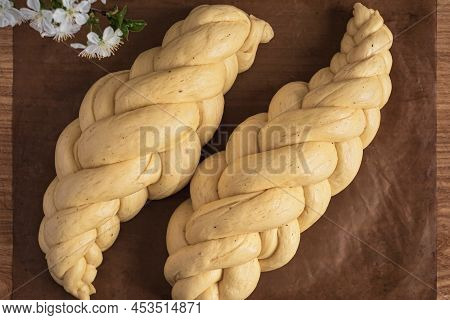 Loafs Of Challah Bread. Proofing Baking Before Placing In The Oven. Braided Sweet Bread Dough. From 