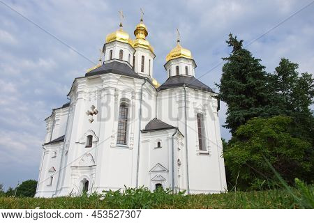 Beautiful Cloudy Sky Over The Ancient Orthodox Church Of St. Catherine In The Ukrainian City Of Cher