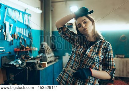Car Reapir, Exam. Young Pretty Girl, Auto Mechanic Working At Auto Service Station Using Different W