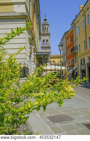 June 2021 Parma, Italy: Old Town, City Street, Colorful Buildings, Bell Tower Of Church Of Chiesa Di