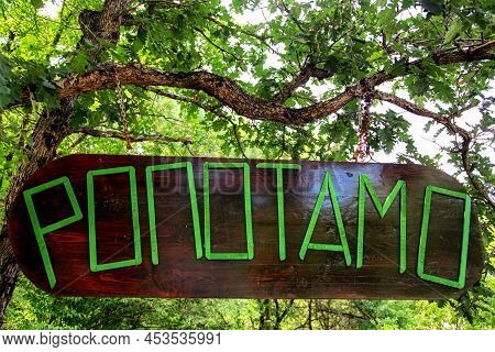Ropotamo, Bulgaria - July 12, 2013: Text Ropotamo On Sign Over River In Bulgaria