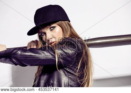 Closeup Portrait Of Concentrated Aggressive Winsome Caucasian Female Baseball Player Athlete Posing