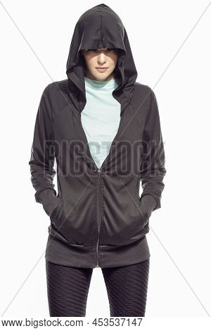 Fitness And Sport Concepts.portrait Of One Sportive Caucasian Female Athlete Posing In Black Hoody W