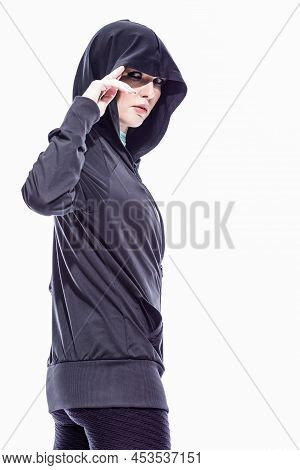 Fitness And Sport Concepts.portrait Of One Sportive Caucasian Female Athlete Posing In Black Hoody W