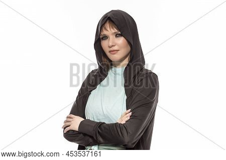 Natural Closeup Portrait Of Smiling Winsome Blond Caucasian Female Athlete In Black Hoody Posing Wit