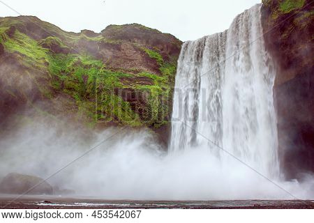 Scogafoss Waterfall In Iceland. Travel Summer Nordic Concept. Natural Icelandic Background.