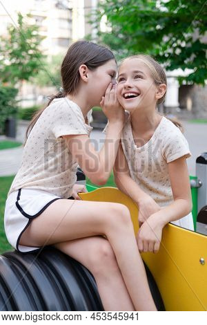 Sisterhood, Friendship. Two Charming Teen Girls Having Fun On A Modern Playground. Sister, Bffs Comm
