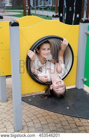 Sisterhood, Friendship. Two Charming Teen Girls Having Fun On A Modern Playground. Sister, Bffs Comm